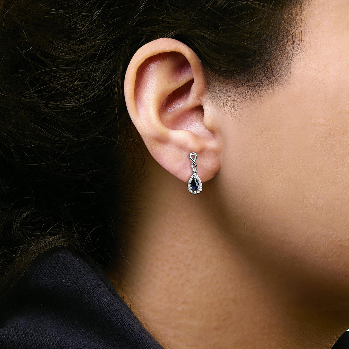10K White Gold Pear Cut Blue Sapphire and 1/7 Cttw Diamond Infinity Drop and Dangle Earrings (I-J Color, I1-I2 Clarity)